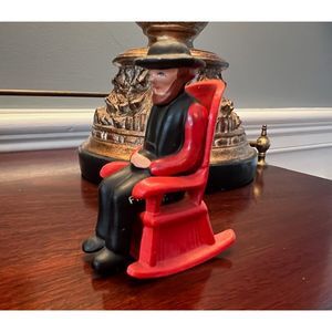 Vintage Salt and Papper Shakers Pennsylvania Amish Cast Iron Man Rocking Chair